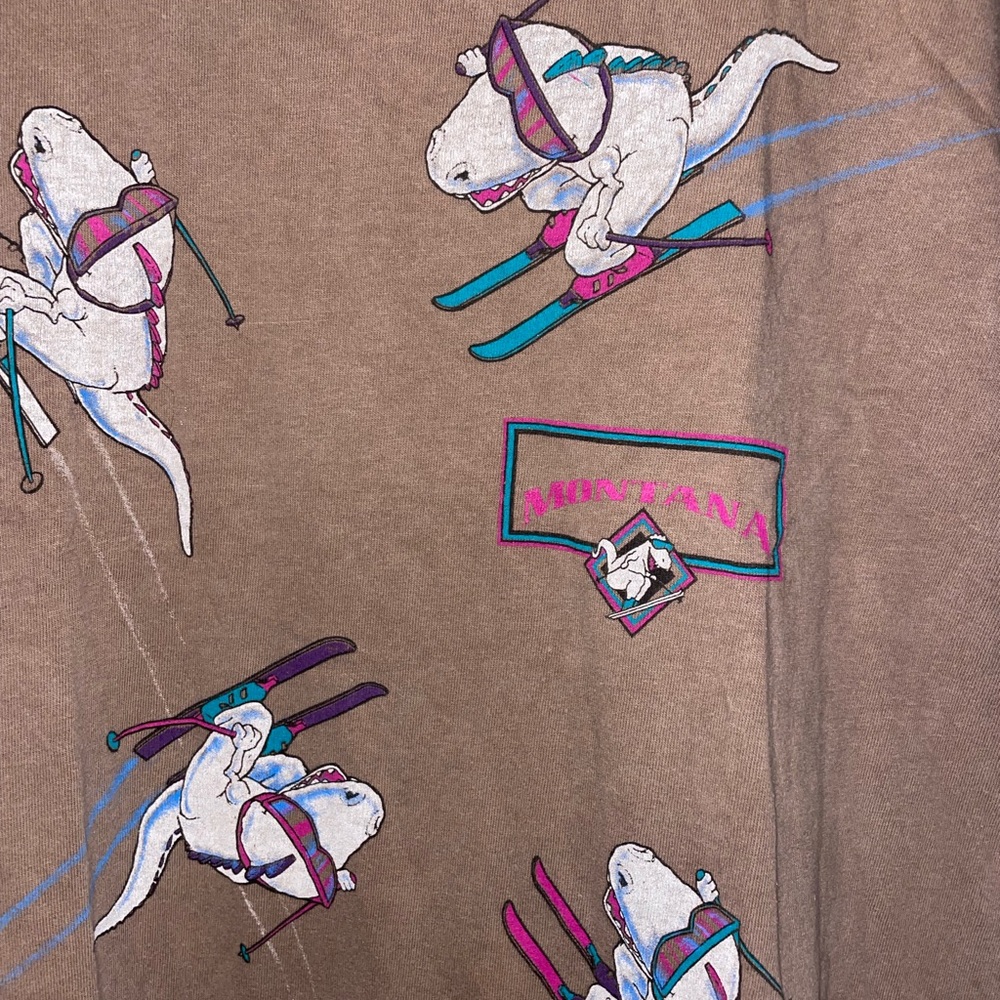 Vintage Dinosaur Skiing Graphic Tee